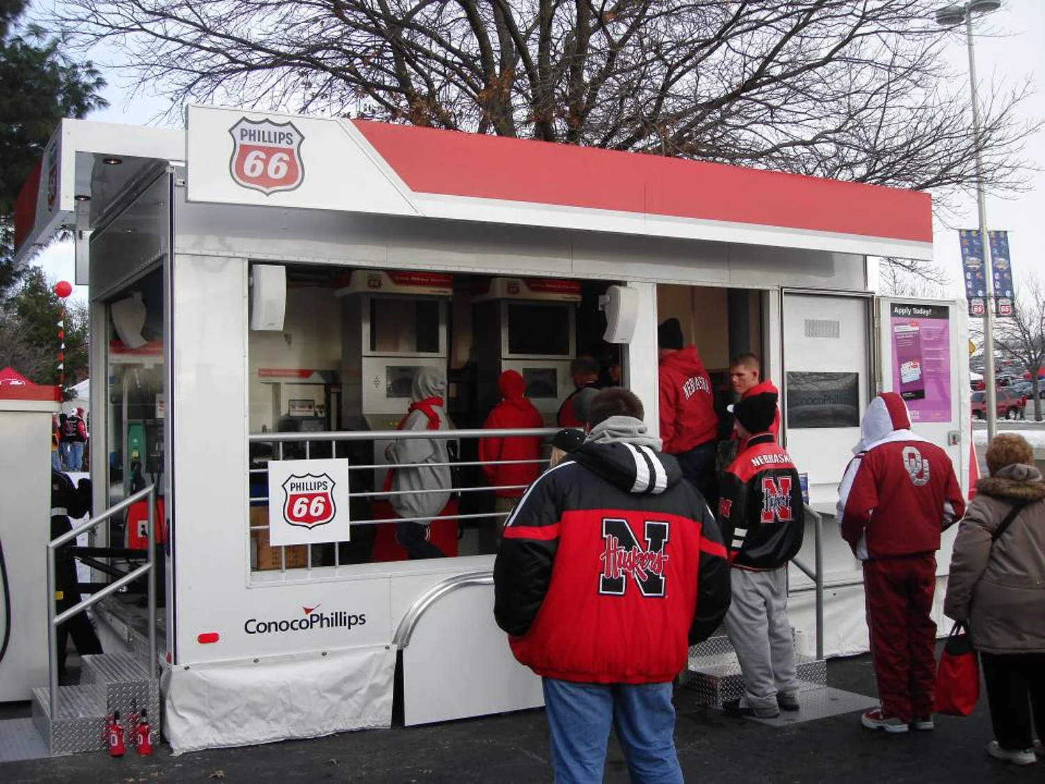 Visitors at a Phillips 66 mobile activation trailer