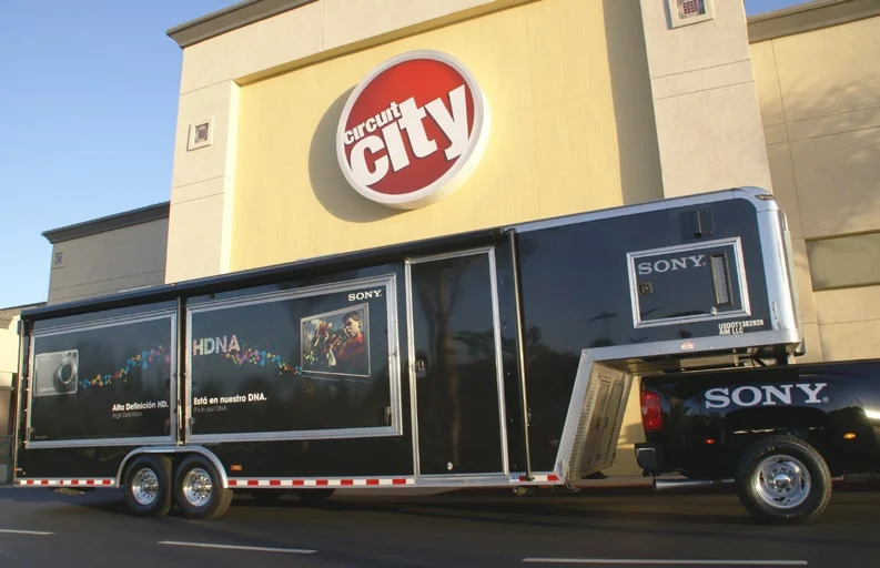 Sony mobile trailer beneath the Circuit City storefront sign