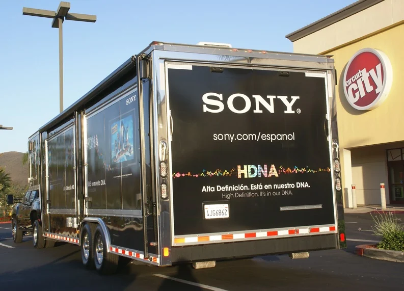 Rear of the Sony-branded trailer beside a Circuit City store