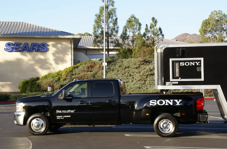 Sony-branded pickup and front of the trailer outside Sears