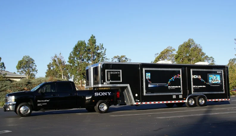 Full side view of the Sony truck and trailer with HDNA campaign graphics