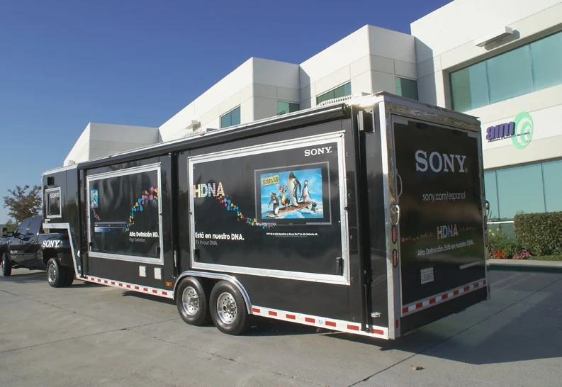 Sony trailer viewed from the side and rear outside the AIM building